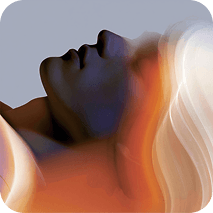 A resting person surrounded by warm flowing light
